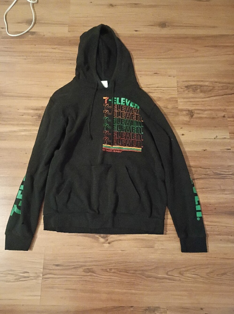 Black Hoodie with Green and Orange 7-Eleven Chest Print